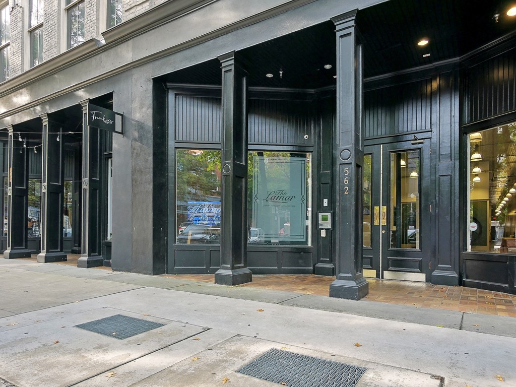 the storefront of a store on a city sidewalk
