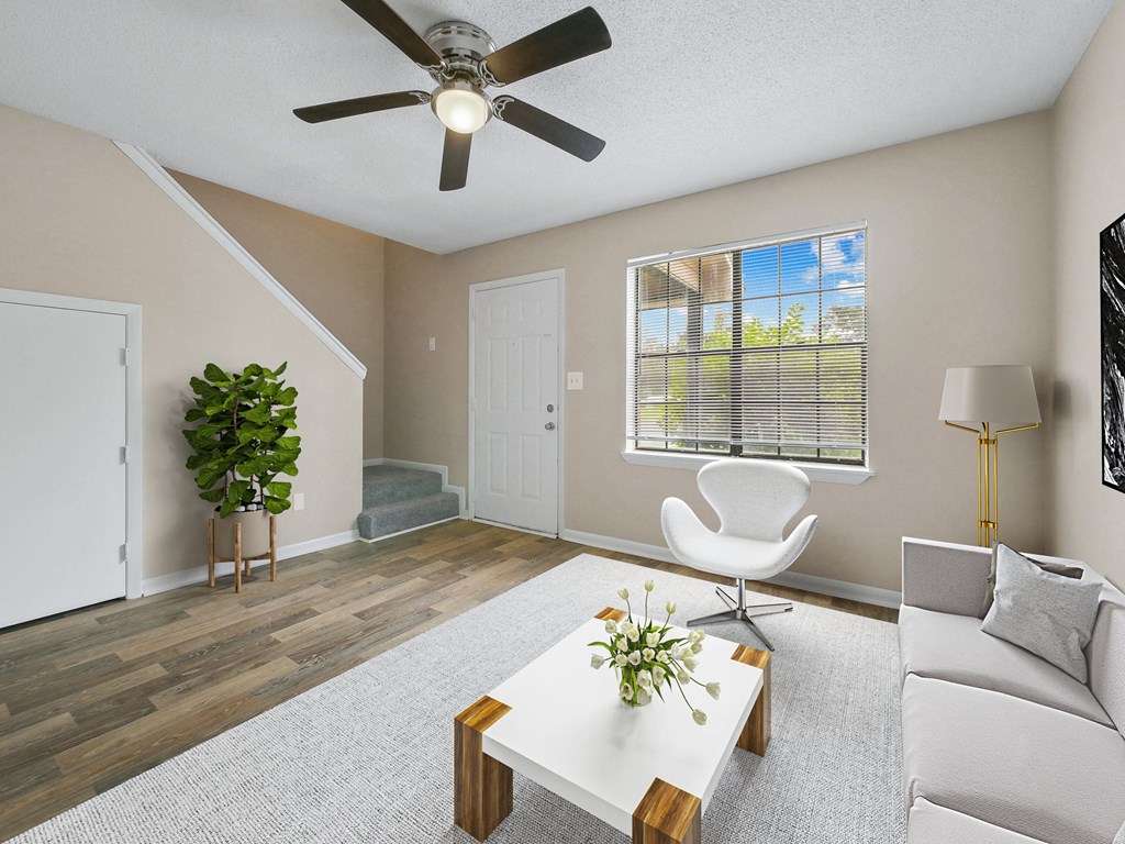 living room with a ceiling fan