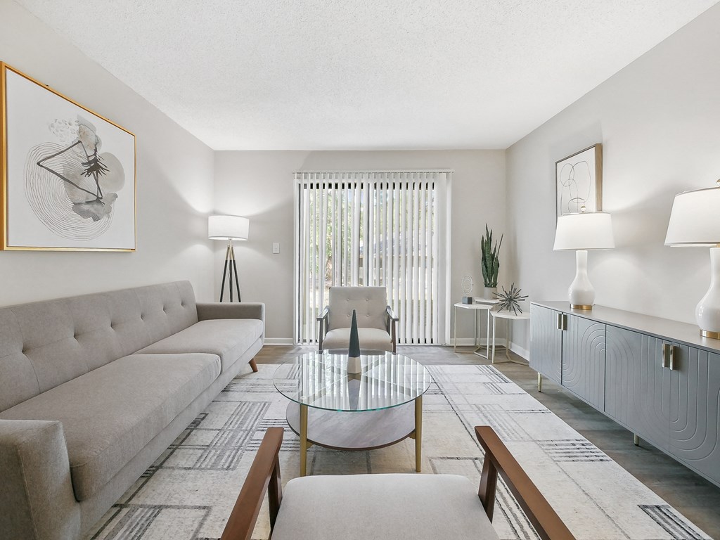 a living room with a couch and a coffee table