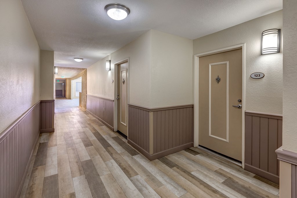 Apartments in Burbank, CA - Interior Building Hallway with Apartment Entrances