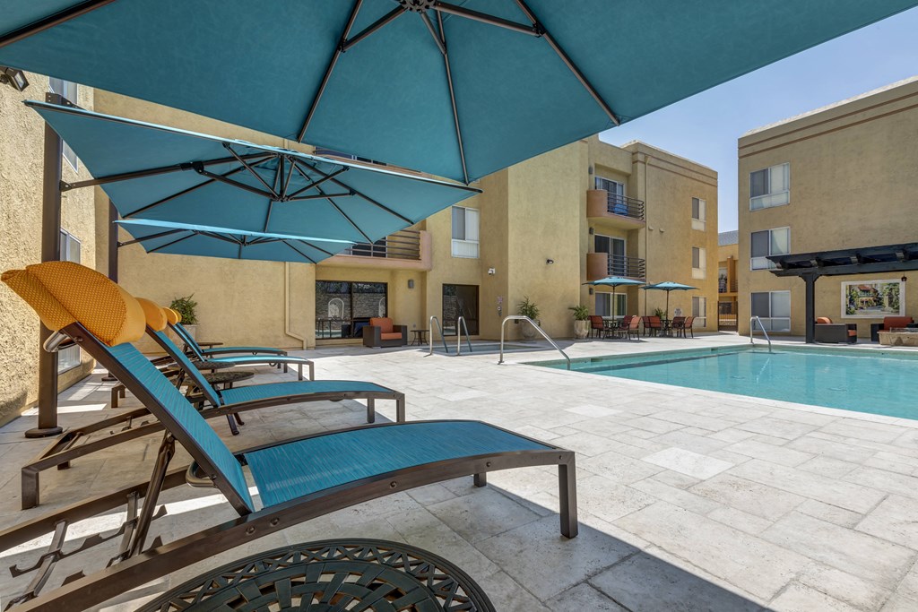 Apartments in Burbank, CA - Pool, Patio and Jacuzzi with Pergola with Fire Pit and Seating.jpg