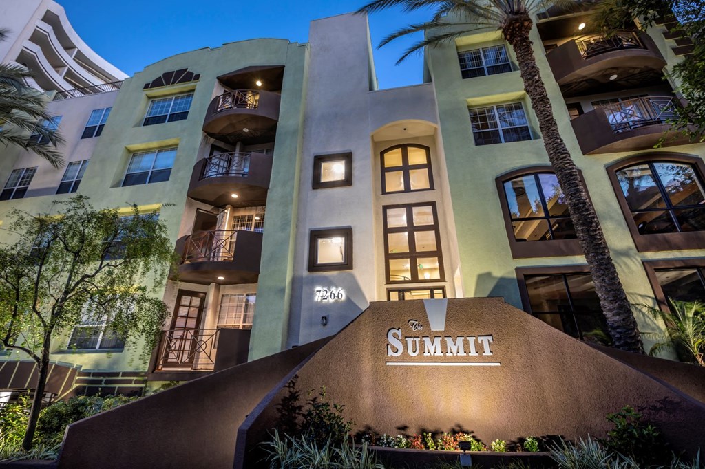 Apartments in Hollywood, CA -  Close Up Night Time Lit Up View of Community and Signage summit