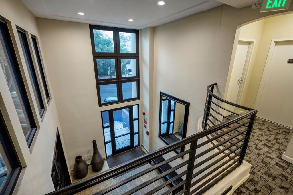 Apartments in Hollywood, CA -  Upstairs View of Building Main Entrance and Lobby Area summit.