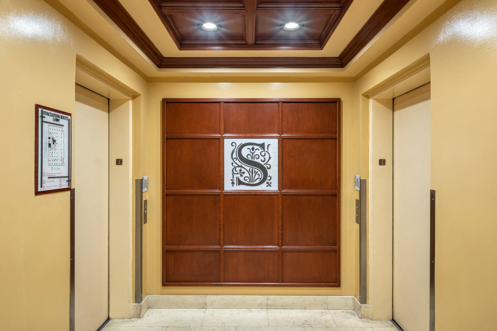 Apartments in Hollywood, CA - Interior of Elevator  Bank Area with Sutton Logo