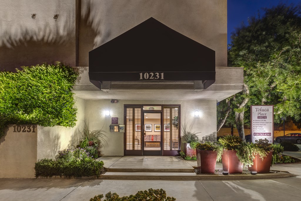 Apartments in Toluca Lake Night Time Exterior Close Up View of Apartment Community Main Entrance  Sign.
