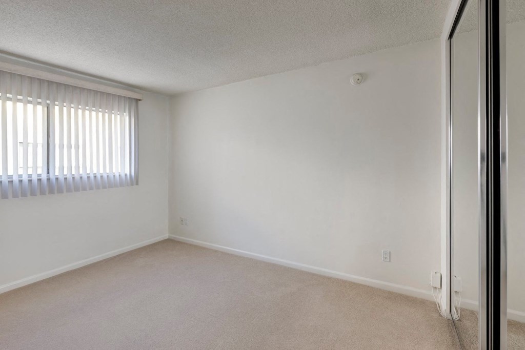 Apartments in West Los Angeles, CA Del Rio bedroom with vertical blind