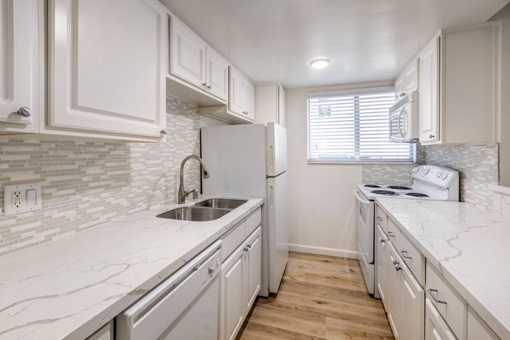 Apartments in West Los Angeles, CA Del Rio kitchen cabinets with appliances and window