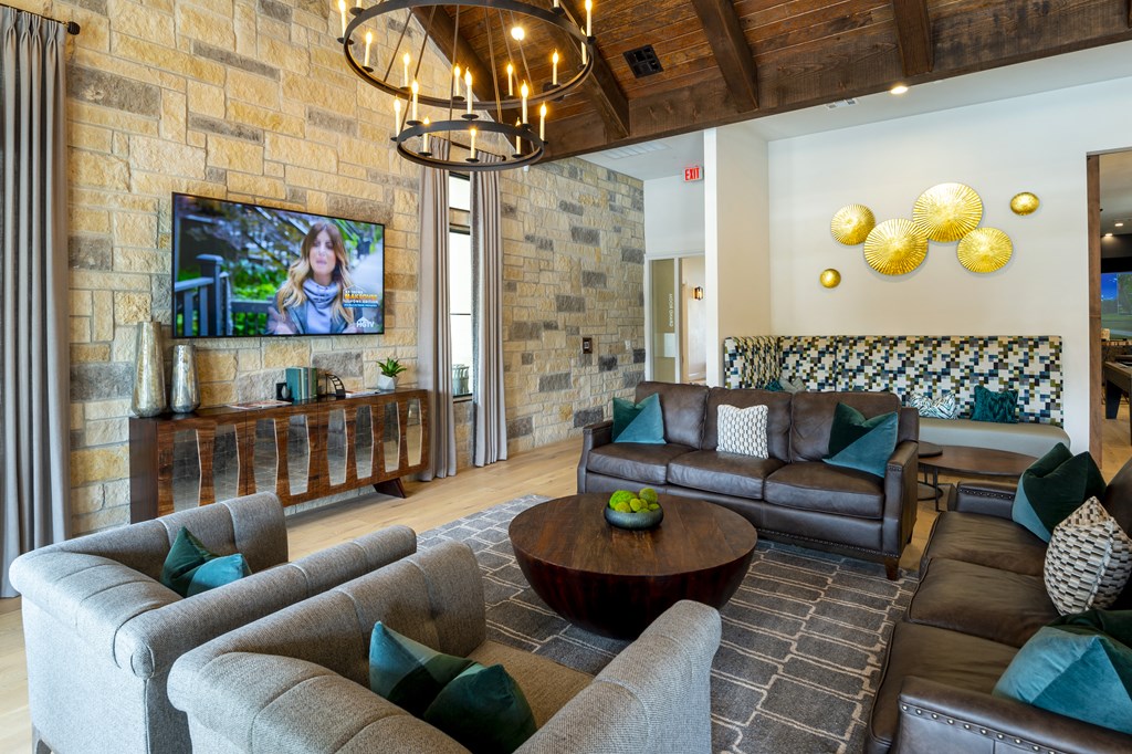 a living room with couches and a coffee table