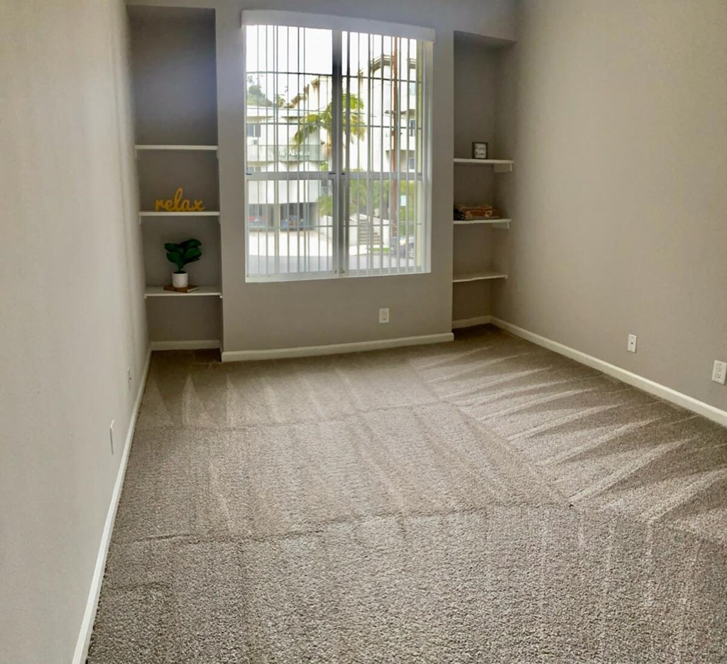 Apartments in Hollywood, CA - The Summit Livingroom with built-in bookcases