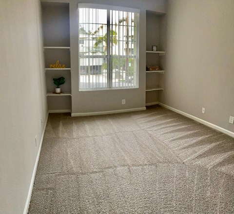 Apartments in Hollywood, CA - The Summit Livingroom with built-in bookcases
