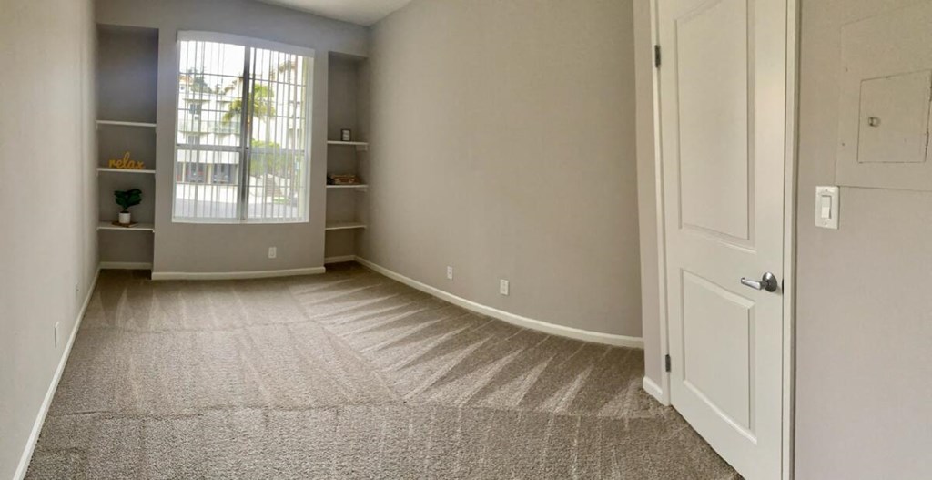 Apartments in Hollywood, CA - The Summit Livingroom with built-in bookcases