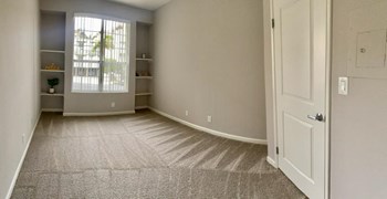 Apartments in Hollywood, CA - The Summit Livingroom with built-in bookcases - Photo Gallery 24