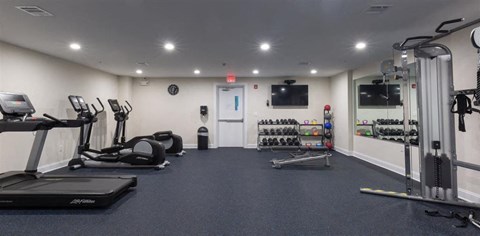 a fitness center with equipment at Zephyr Ridge Apartment Homes, New Jersey