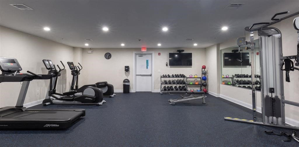 a fitness center with equipment a fitness center with equipment at Zephyr Ridge Apartment Homes, New Jersey