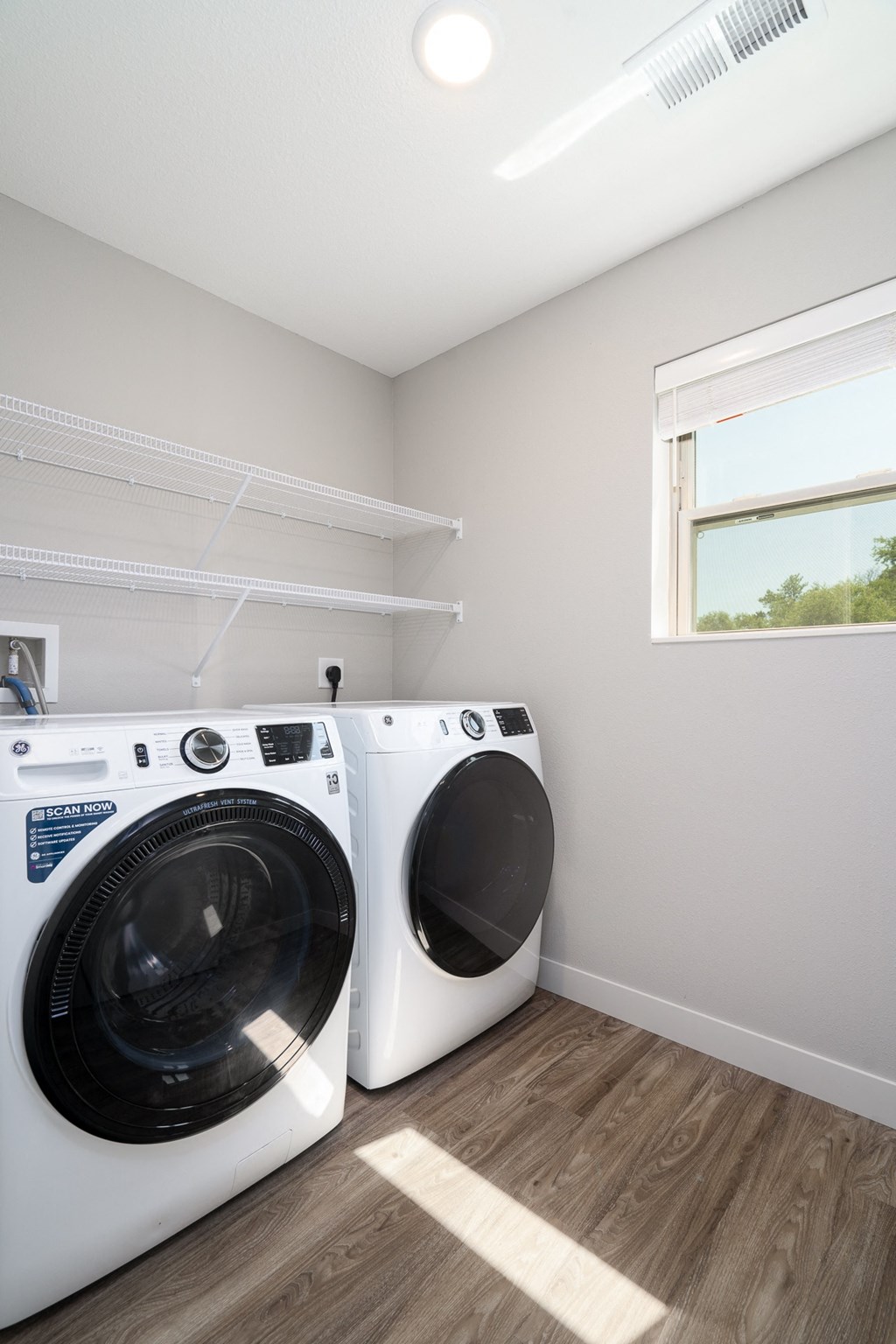 the preserve at ballantyne commons laundry room with washer and dryer