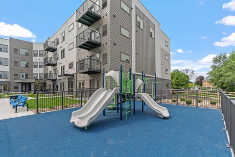 5240 Apts playground in front of building