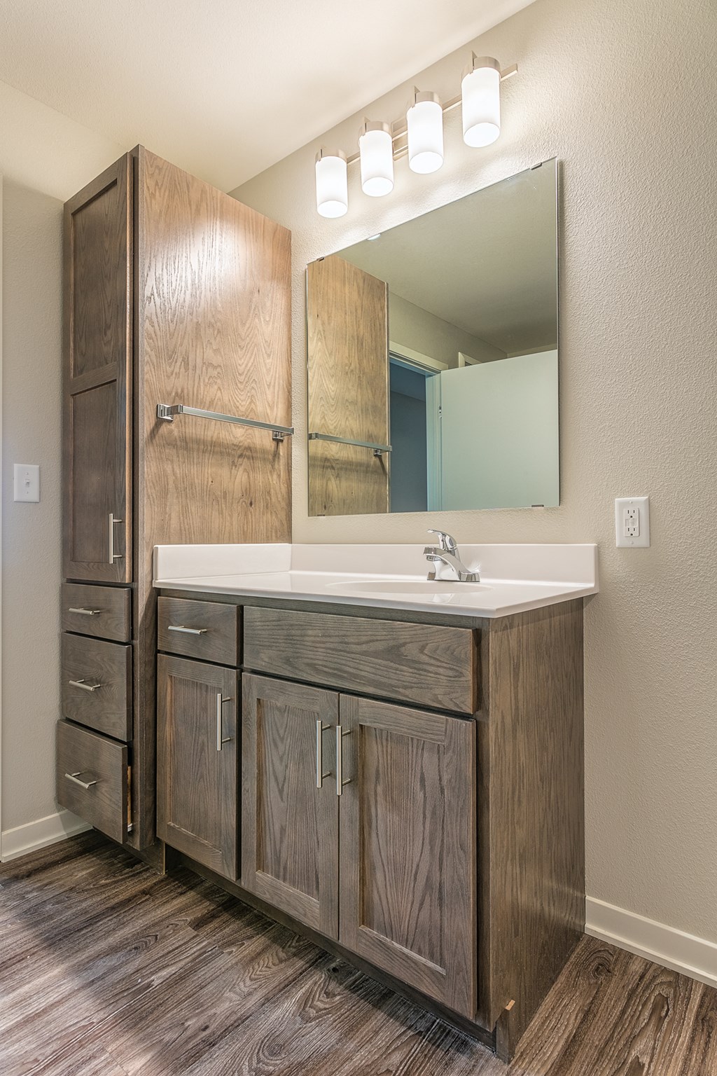 a bathroom with a sink and a mirror