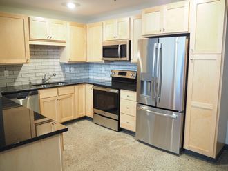 fully renovated kitchens at the historic minnesota building live/work flats