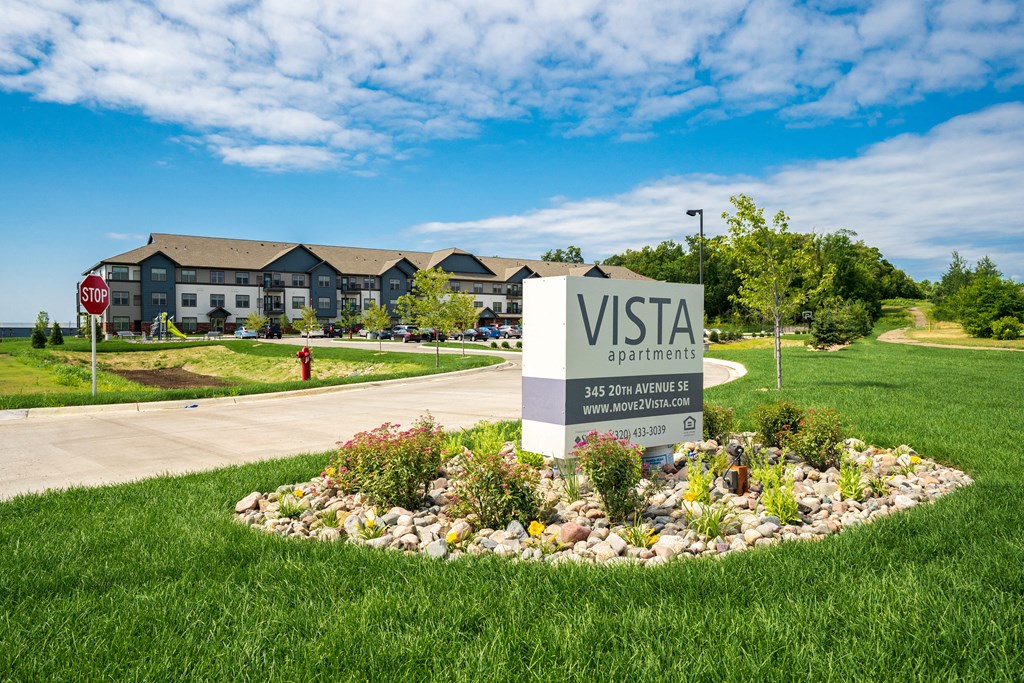 the view sign in front of the building apartments
