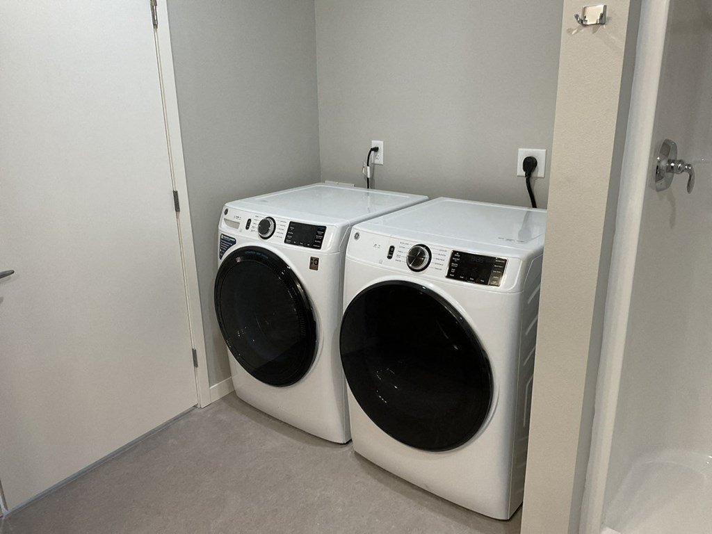 a washer and a dryer in a laundry room