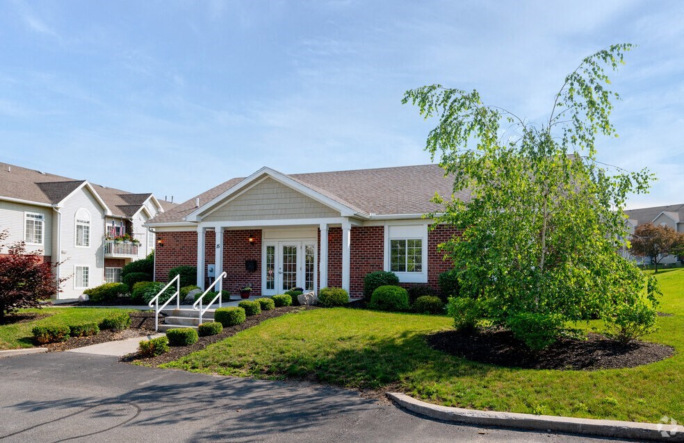 a house with a tree in front of it