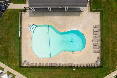 A small pool with a blue line in the middle.