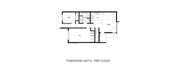 A black and white drawing of a house's first floor plan.