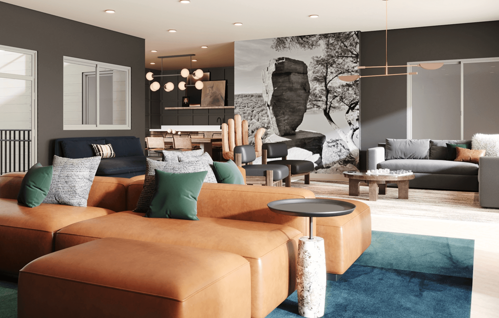 A modern living room with a large sectional sofa and a coffee table.