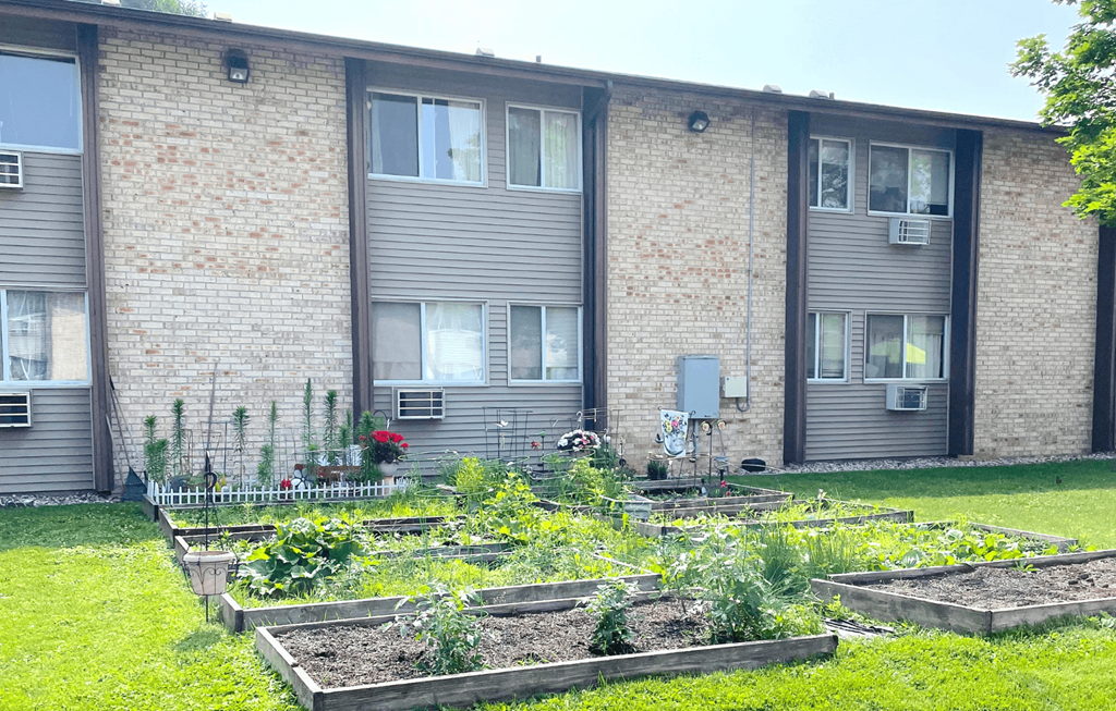 a garden in front of a building