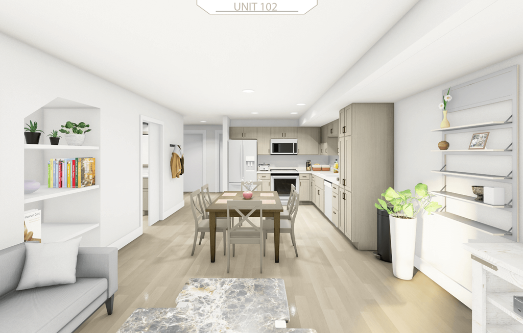 an open kitchen and dining room with a table and chairs