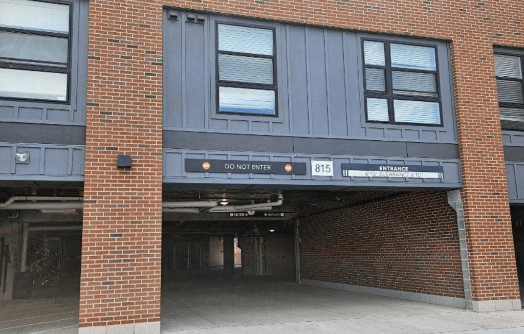 a building with an open garage door