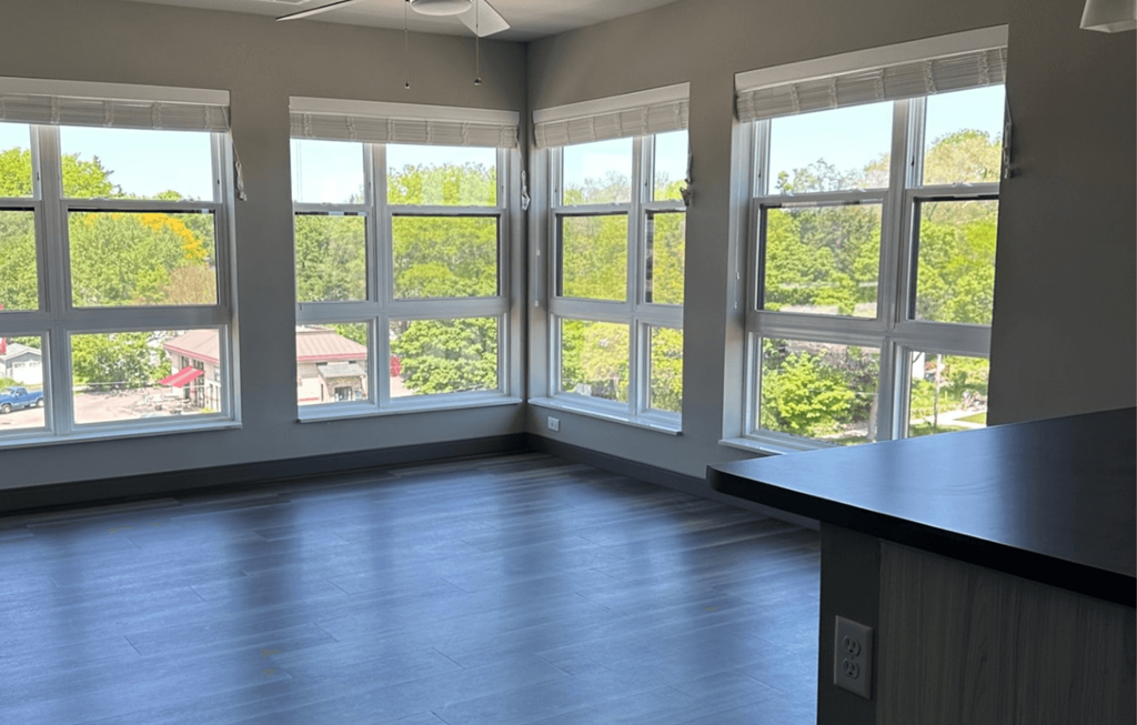 an empty room with a large window