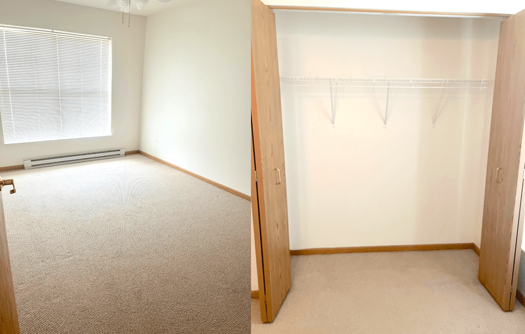 a bedroom with a closet and a window