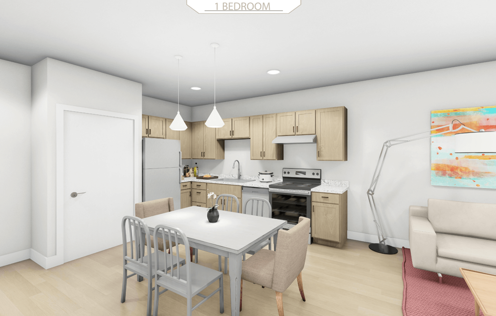 an open kitchen and dining room with a table and chairs