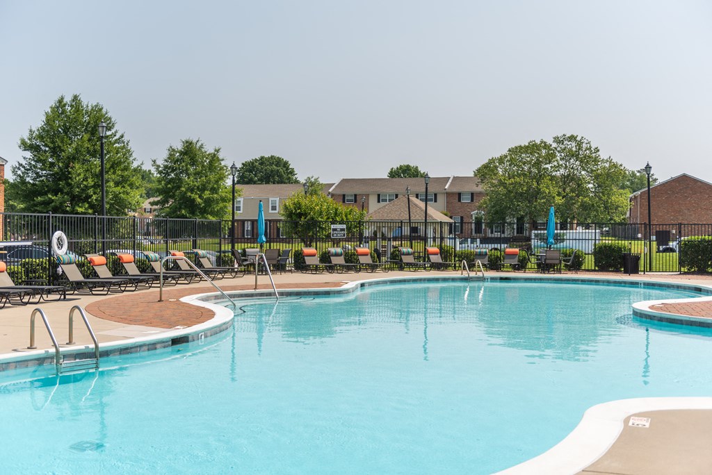 our apartments offer a swimming pool with chaise lounge chairs