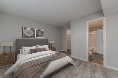 A bedroom with a large bed and two lamps.