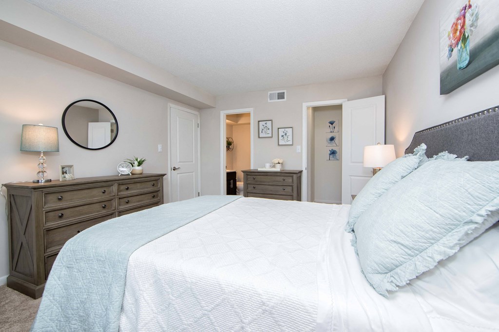Spacious bedroom with entrance to closet and bathroom at Brittany Place Apartments in Norfolk VA