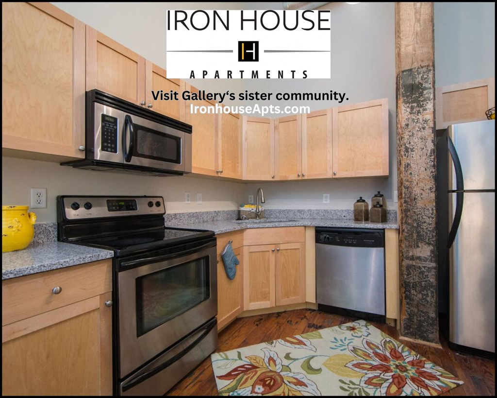 a kitchen with wood cabinets and stainless steel appliances