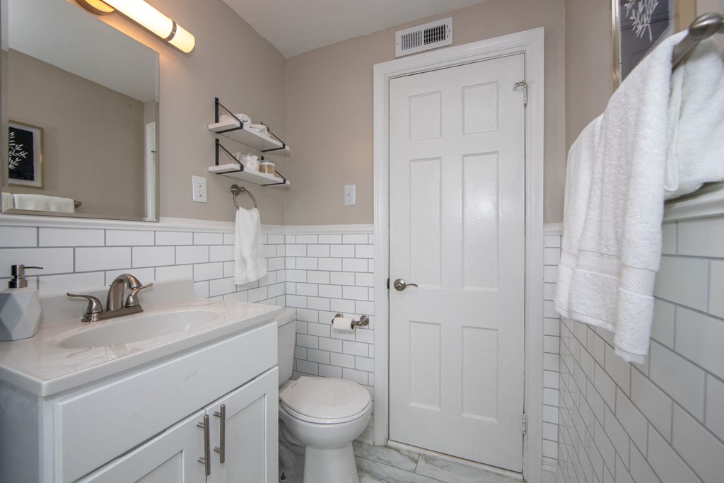 a small bathroom with a toilet and a sink