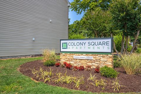 colony square apartments sign in front of apartment building