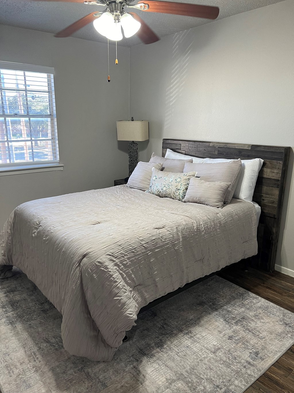 Bedroom with Cozy bed at Jackson Way Apartments, Texas
