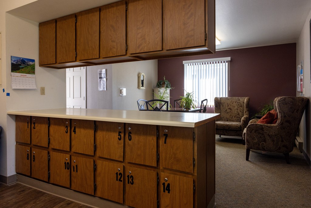 a kitchen with wooden cabinets and a counter top