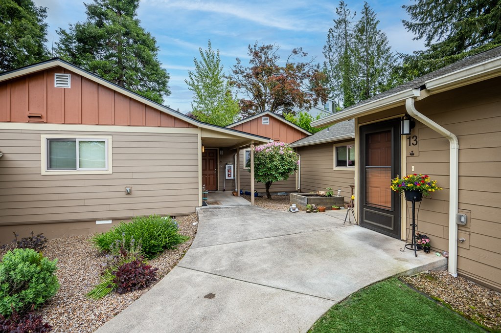 A brown house with a brown door and a brown window.