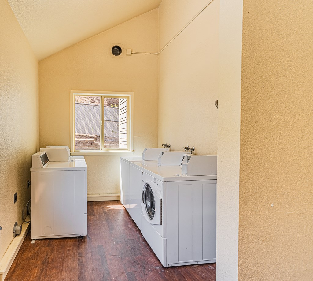 A laundry room with a washer and dryer.