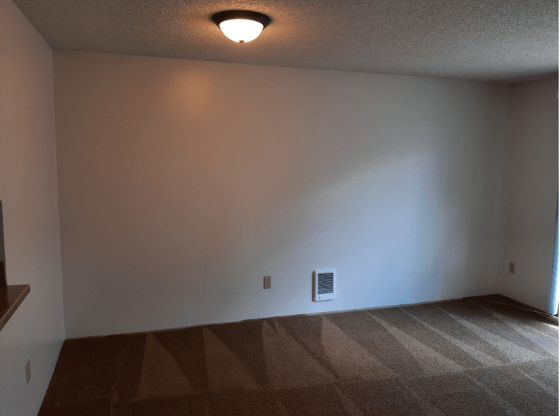 View of the Living Room in a Unit at Eagle Cap Pineview Apartments in Joseph, Oregon