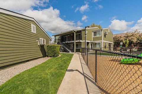 the yards are fenced in with a chain link fence