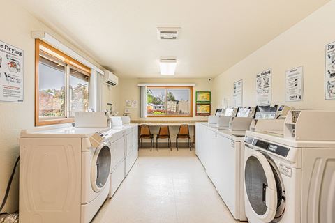the laundry room is equipped with washes and dryers