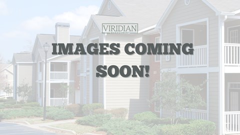 A row of houses with the text "Images Coming Soon!" overlaid on the image.