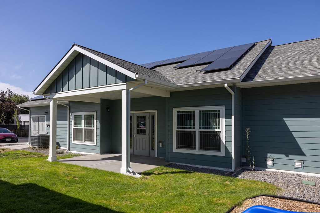a house with solar panels on the roof