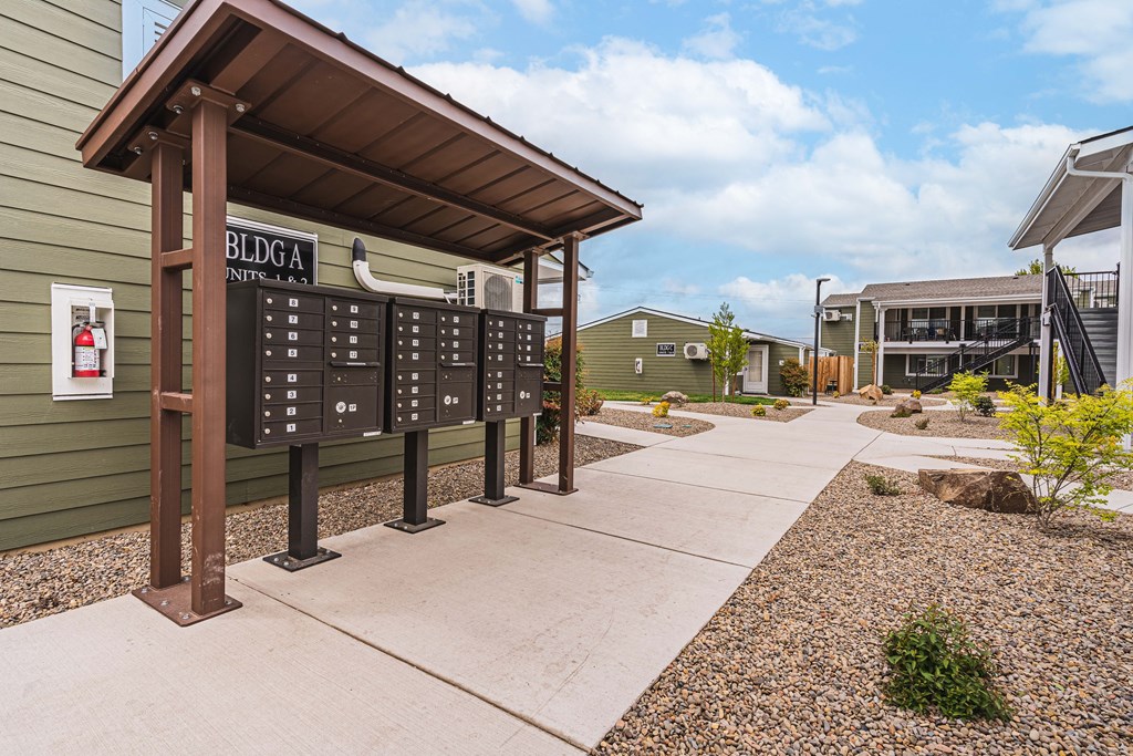 A parking lot with a sign that says BLDG A.